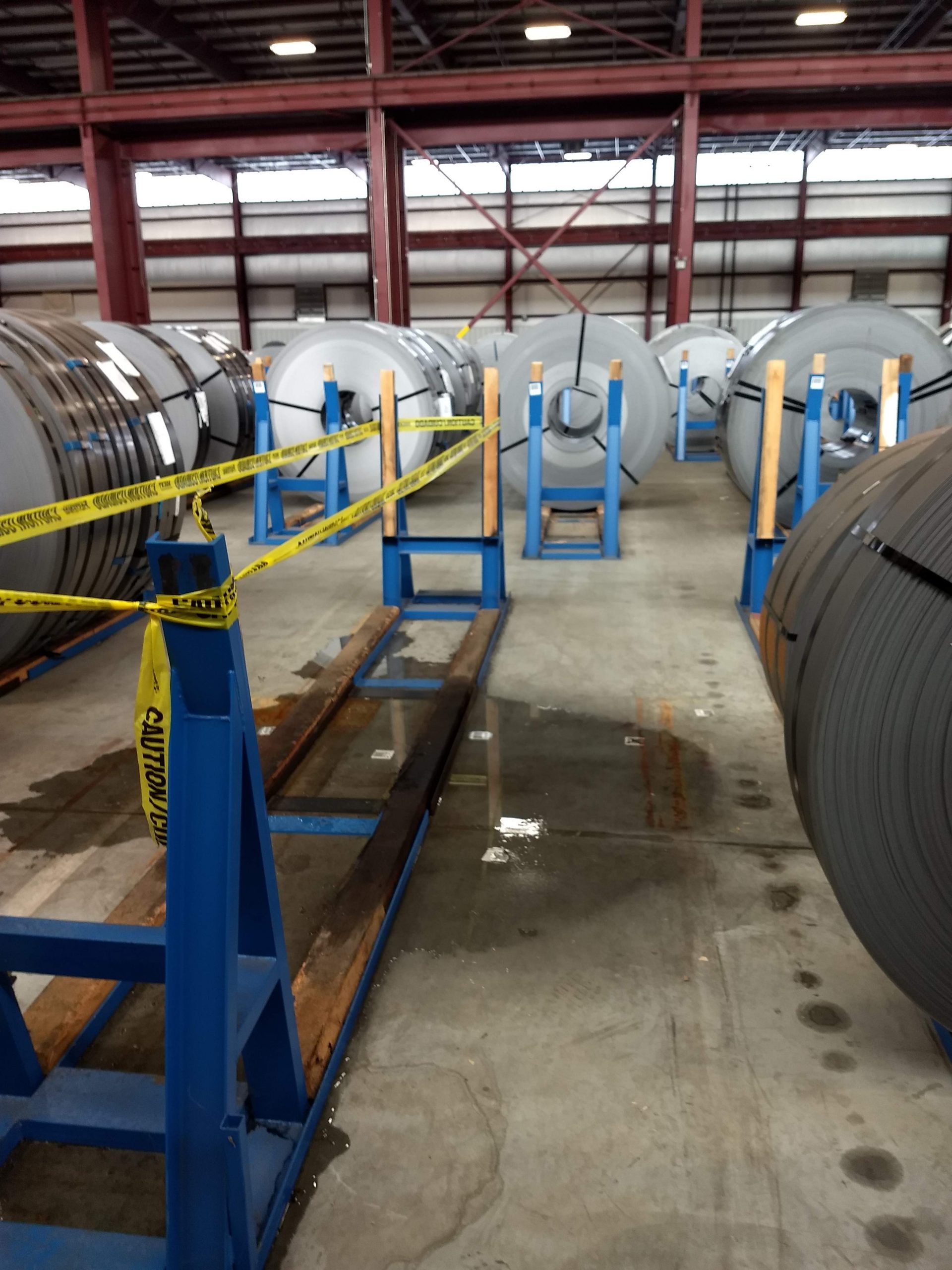 Aluminum Industry Roof Leak A leaky roof continuously dripping water on to the production floor. If the roof leak is not repaired the water will eventually rust the aluminum.