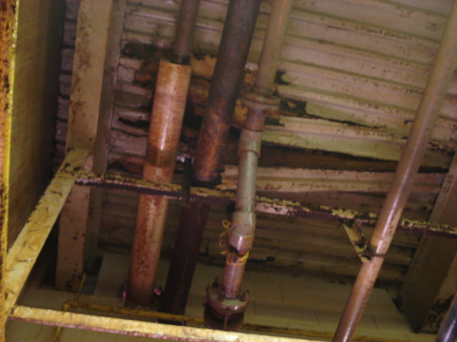Chemicals Facility Roof Damage: Metal Roof Underside Chemicals Facility Roof Damage: Underside