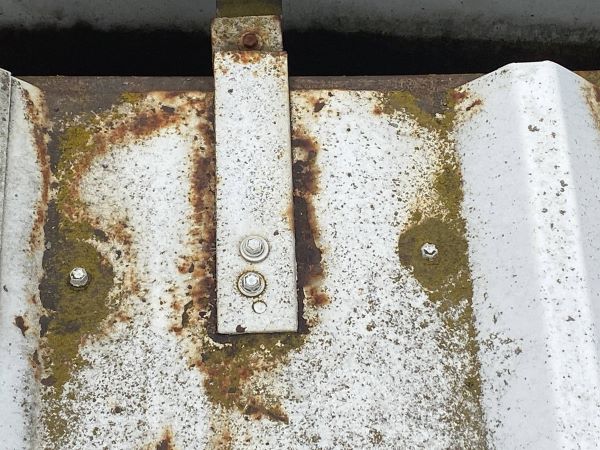 Formaldehyde Corrosion Metal Roof Eve Edge Metal roof edge corrosion at a Tool Manufacturing company.