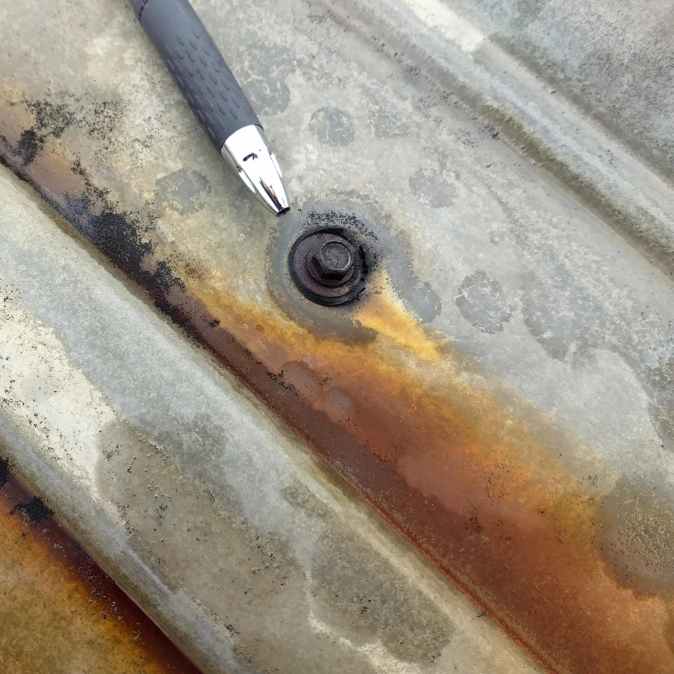 Incorrectly Installed Metal Roof Fastener Incorrectly installed metal roof fastener