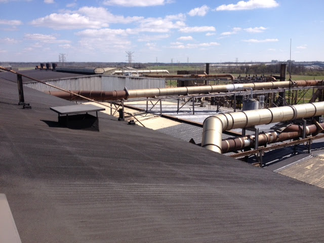 A Restored Transite roof over an industrial steel plant building