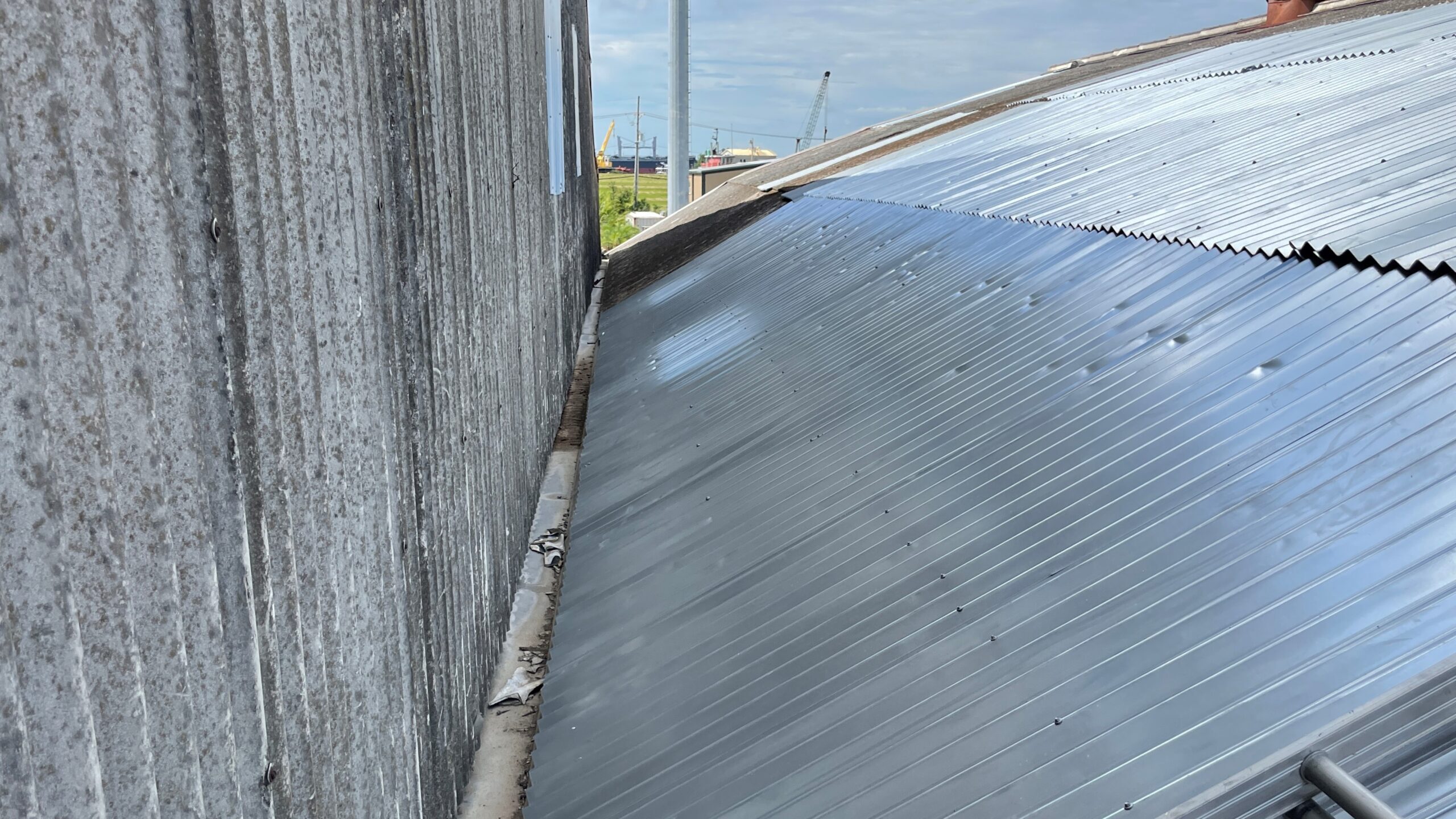 Hidden Transite Roof Panels Transite Roof Panels hidden under metal panels.